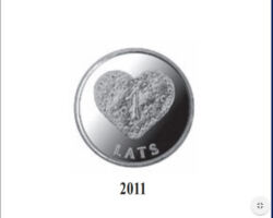 LV 1 lata monēta "Piparkūku sirds" (Rūta Briede un Laura Medne), kaltas Koninklijke Nederlandse Munt (Nīderlande).